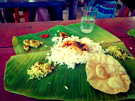 traditional kerala lunch on a banana leaf