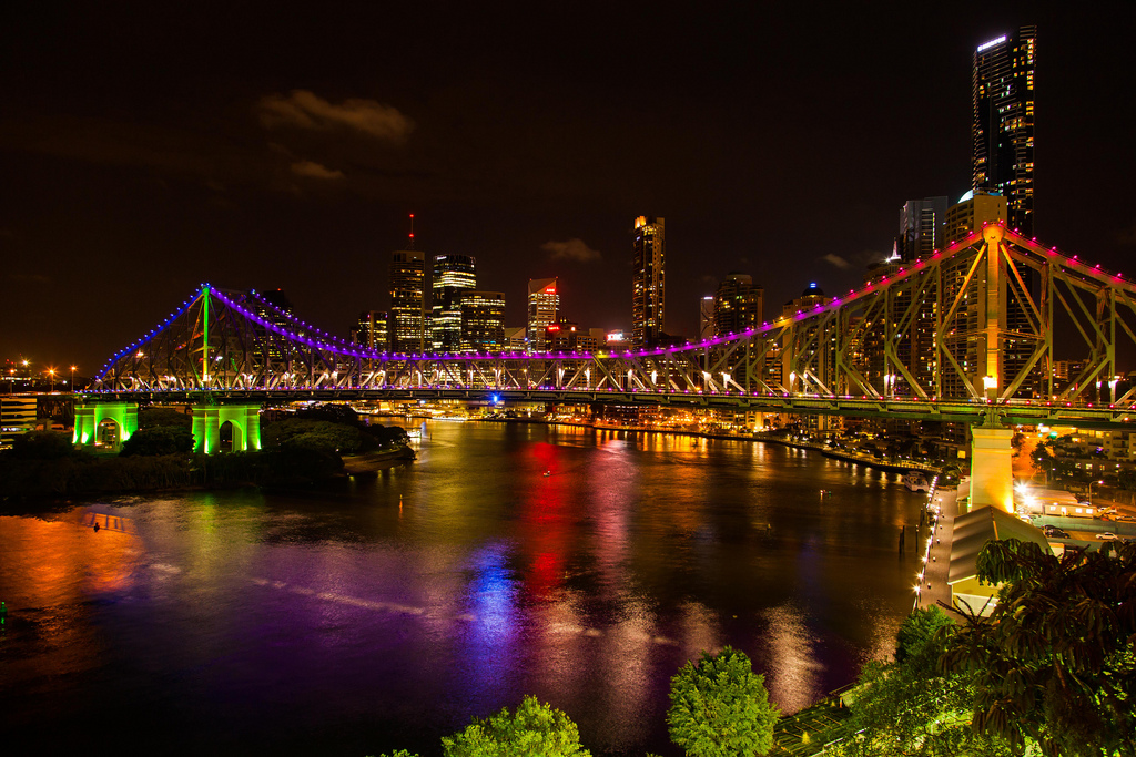 Image of Brisbane at night and Story Bridge illuminated in rainbow colours