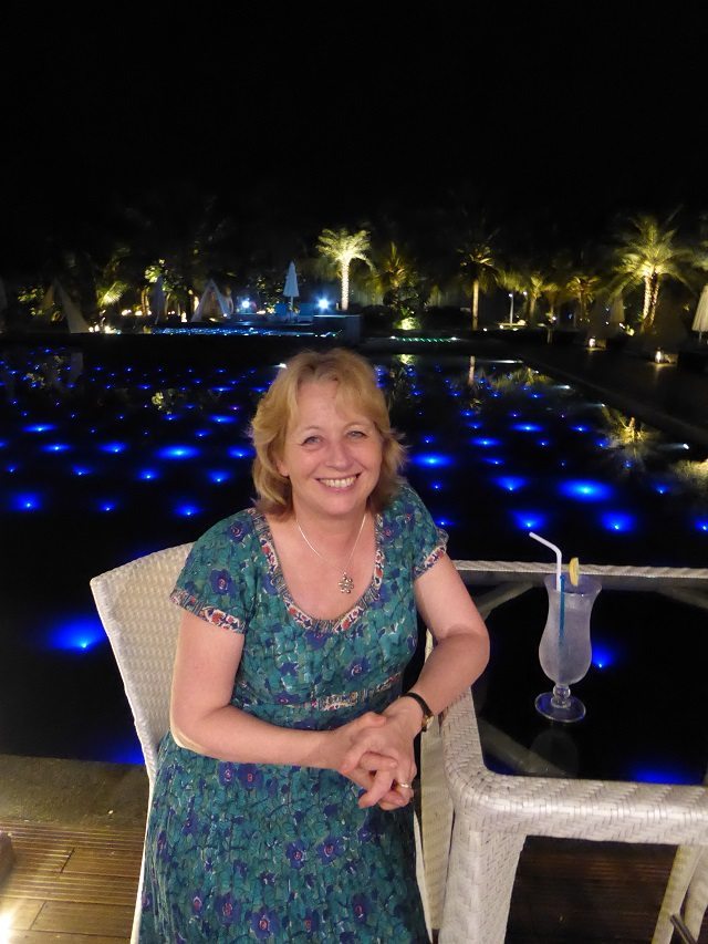 My Mum enjoying cocktails by the pool at Planet Hollywood Resort in South Goa