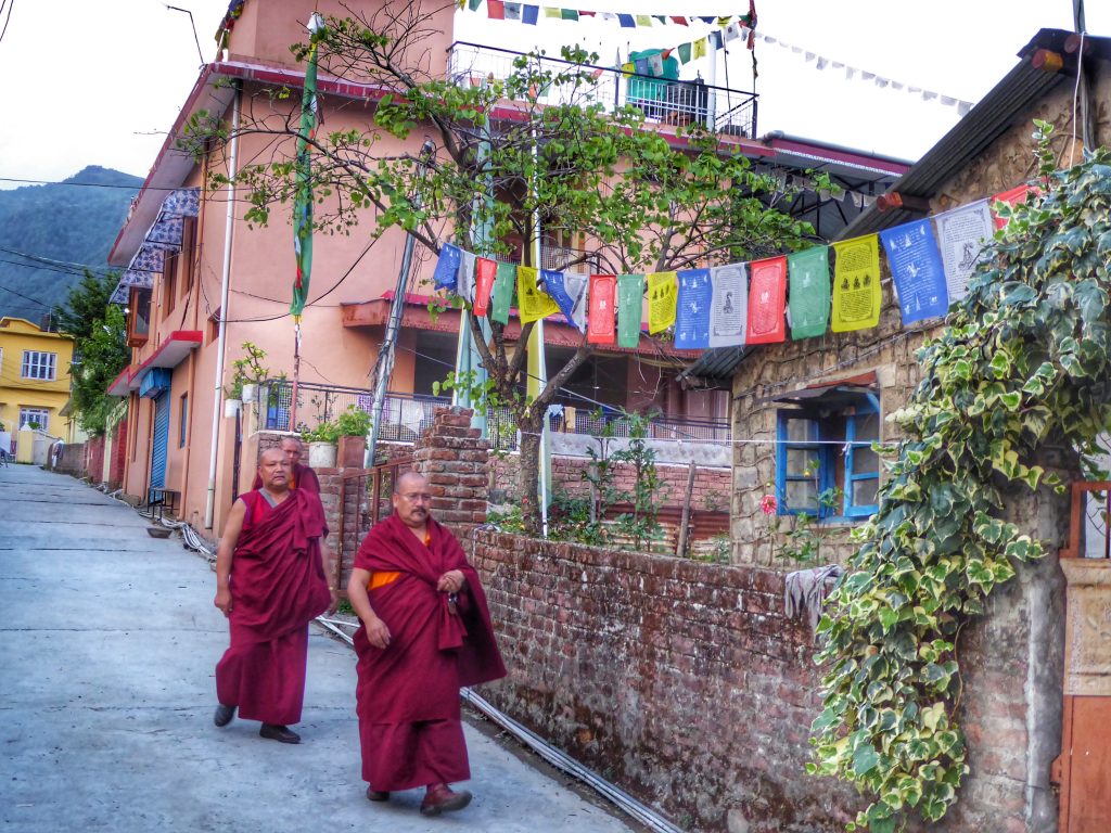 Monks walking through the Tibetan Colony in Bir