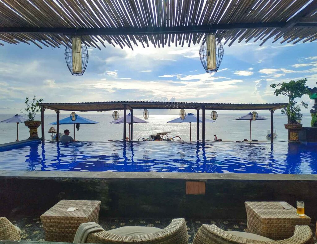 swimming pool overlooking the beach in bali