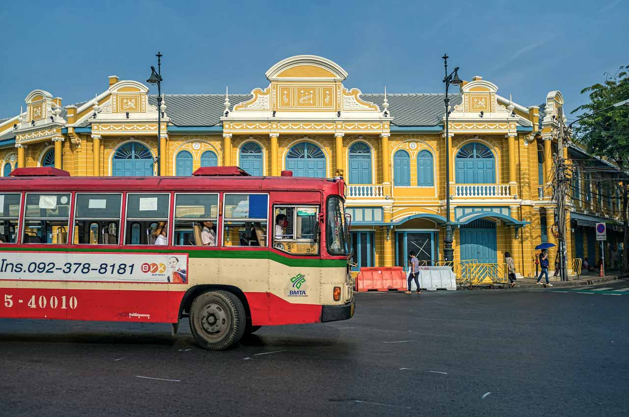 old bangkok yellow buildings and bus