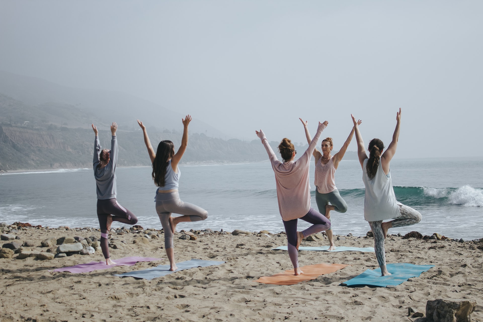 yoga class on the beach