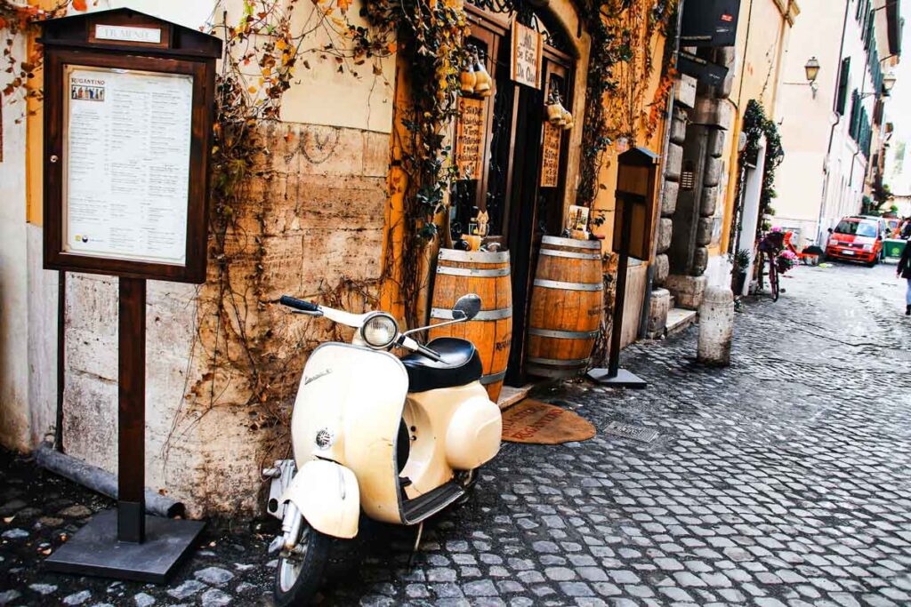 rome scooter vespa trastevere neighbourhood