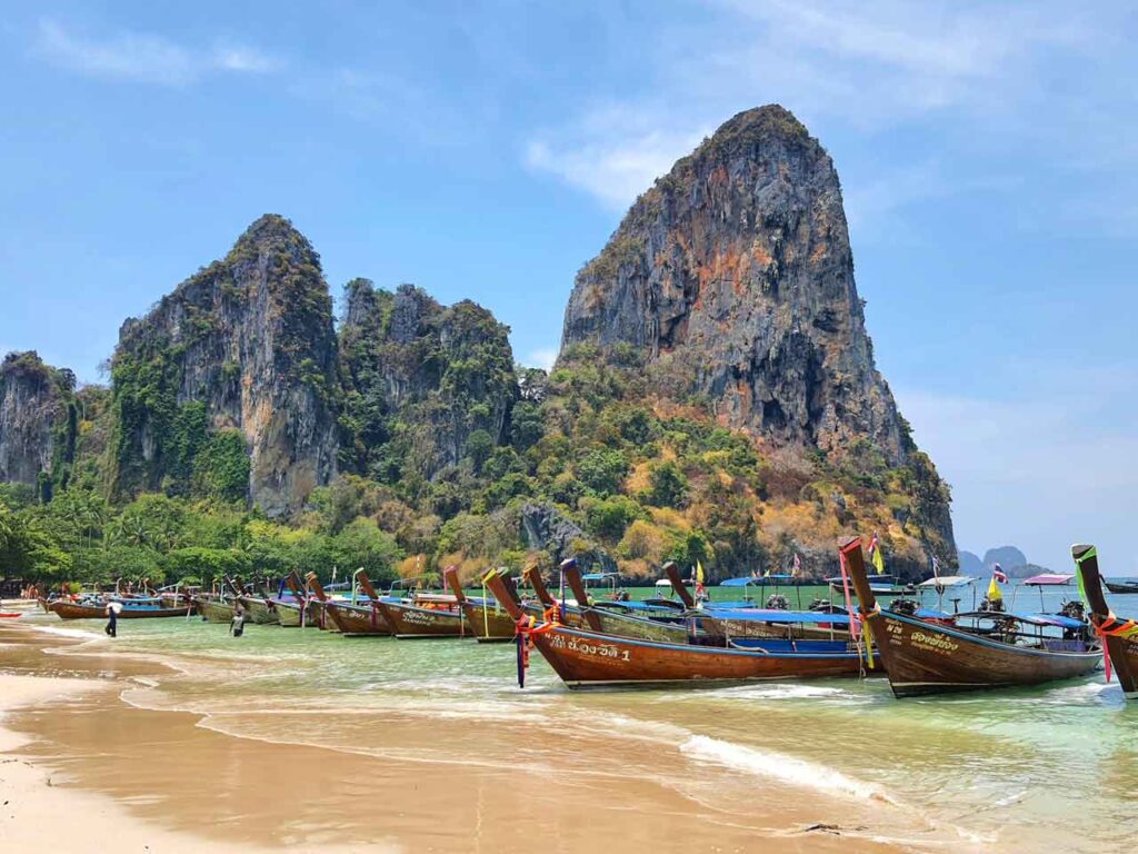 longtail boats on railay beach west krabi